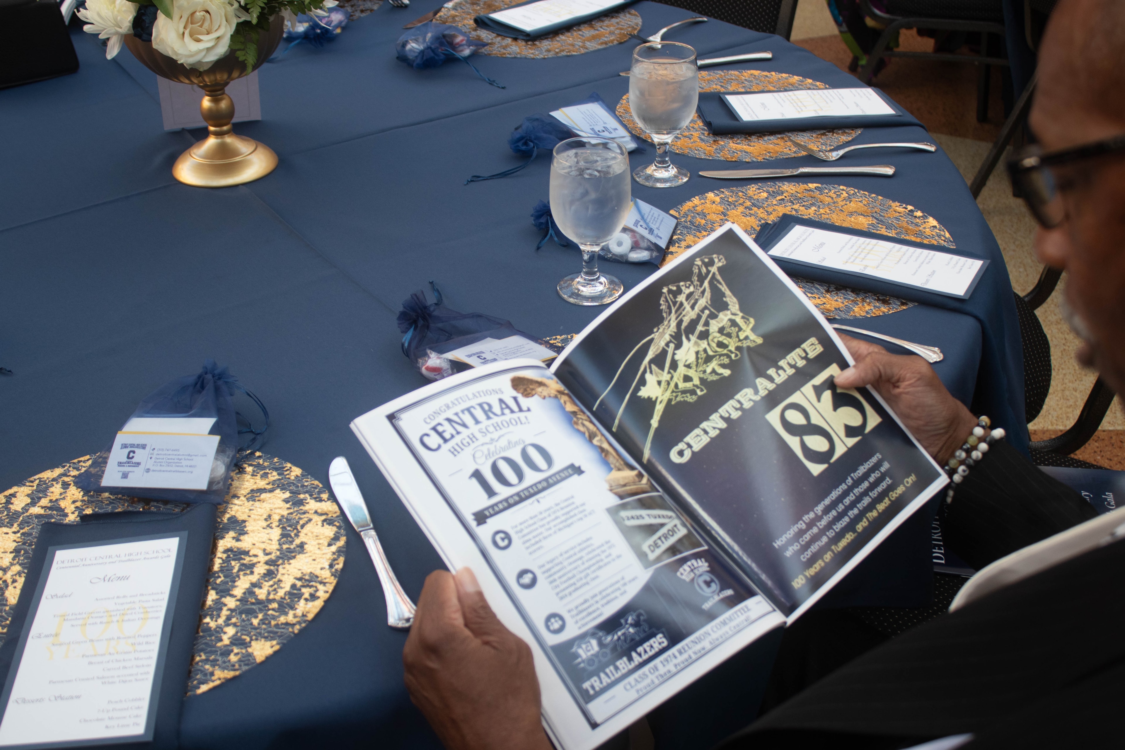 Formal dinner table Centennial celebration program